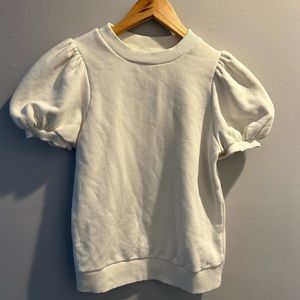 Woman’s Off white short sleeved top with puffy sleeves, size XS
